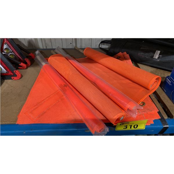 STACK OF ORANGE MESH SAFETY FLAGS