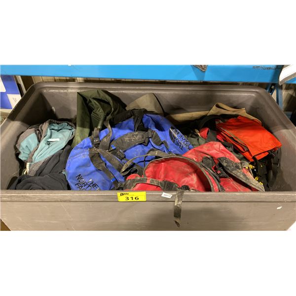 LARGE GREY MOBILE BIN OF ASSORTED USED TRANSPORT BAGS, DUFFEL BAGS, & BACKPACKS *ROLLING BIN NOT