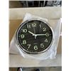 Image 3 : 3 NEW 12 INCH WALL CLOCKS. TWO ARE BLACK WITH A CHROME FINISH. ONE IS BLACK WITH A WHITE FINISH