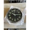 Image 3 : 3 NEW 12 INCH WALL CLOCKS. TWO ARE BLACK WITH A CHROME FINISH. ONE IS BLACK WITH A WHITE FINISH