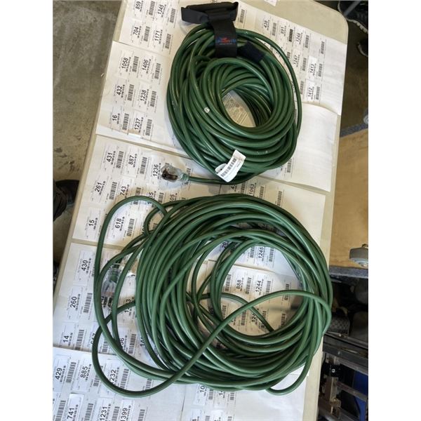 2 GREEN EXTENSION CORDS. APPROX 100 FEET EACH. ONE IS FRIED AND DOESN'T WORK