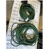 Image 1 : 2 GREEN EXTENSION CORDS. APPROX 100 FEET EACH. ONE IS FRIED AND DOESN'T WORK