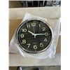 Image 3 : 3 NEW 12 INCH WALL CLOCKS. TWO ARE BLACK WITH A CHROME FINISH. ONE IS BLACK WITH A WHITE FINISH