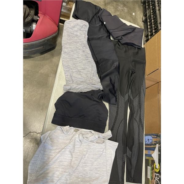 TRAY OF LADIES LULULEMON CLOTHES