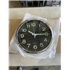 Image 3 : 3 NEW 12 INCH WALL CLOCKS. TWO ARE BLACK WITH A CHROME FINISH. ONE IS BLACK WITH A WHITE FINISH