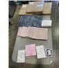 Image 1 : TRAY OF PARTY SUPPLIES INCLUDING COLORED ENVELOPES, ACRYLIC CUPCAKE STANDS, GUEST BOOKS, THANK YOU L