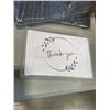 Image 3 : TRAY OF PARTY SUPPLIES INCLUDING COLORED ENVELOPES, ACRYLIC CUPCAKE STANDS, GUEST BOOKS, THANK YOU L