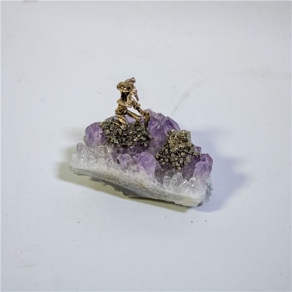 PYRITE MINER ON AMETHYST CLUSTER