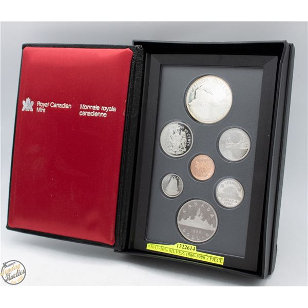 #5013-50% SILVER-1886-1986 7 PIECE SILVER SET WITH