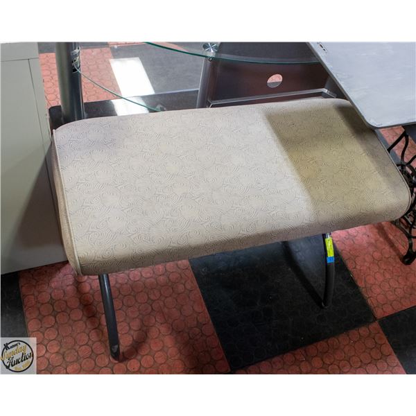 VANITY BENCH FEATURES A METAL FRAME AND CUSHIONED