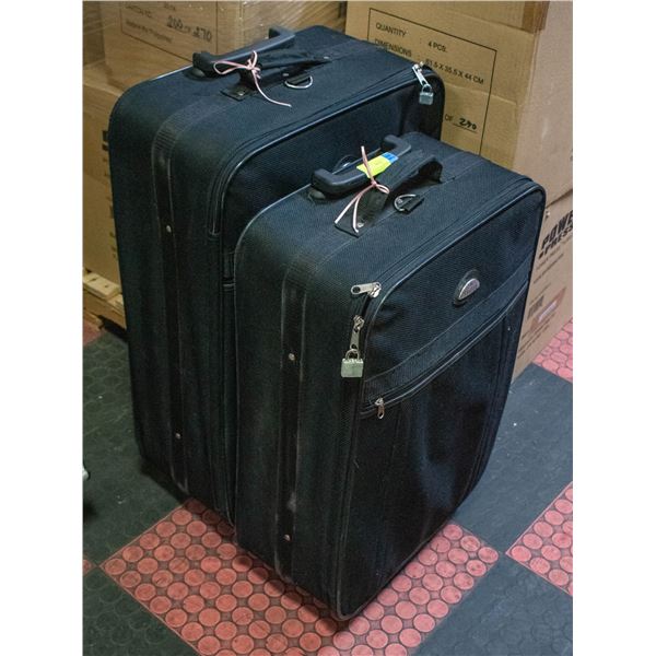 LOT OF 4 BLACK SUIT CASES