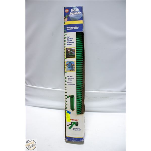 NEW IN BOX HOSE MASTER 50FT W/SPRAP NOZEL