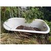 Image 2 : cast iron Bath tub they used as a fountain