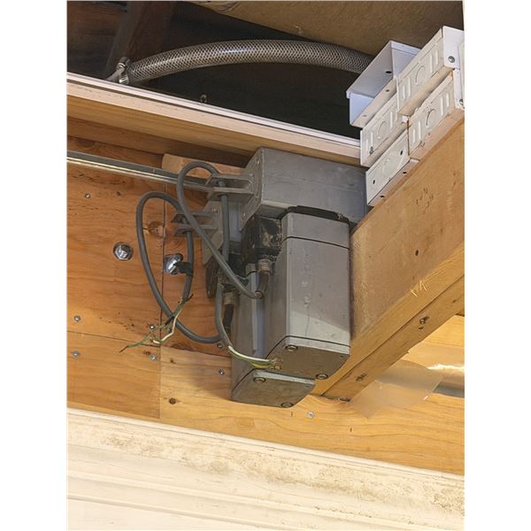 Electric gate opener has long arm on wood part Pair