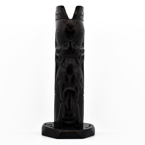 Hand-Carved Black Totem Pole Sculpture