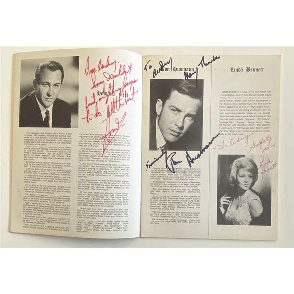 Howard Keel, Ron Husmann, and Linda Bennett signed Camelot program