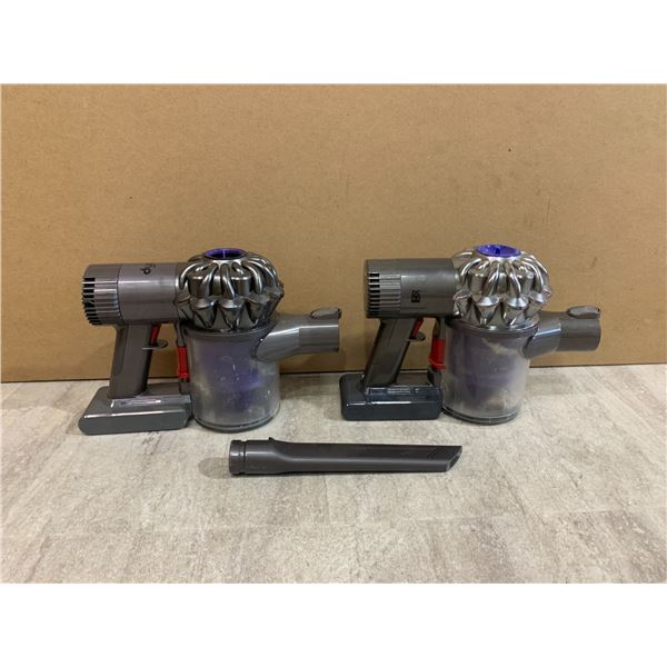 Lot of 2 Handheld Dyson Vacuums with One Attachment