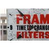 Image 2 : Vintage "Fram Filters" metal electric wall clock with glass face, partially lights up, working at ti