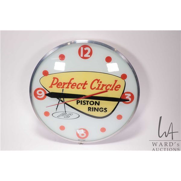 Vintage Perfect Circle Piston Rings electric wall mount clock, 16" in diameter, working at time of c