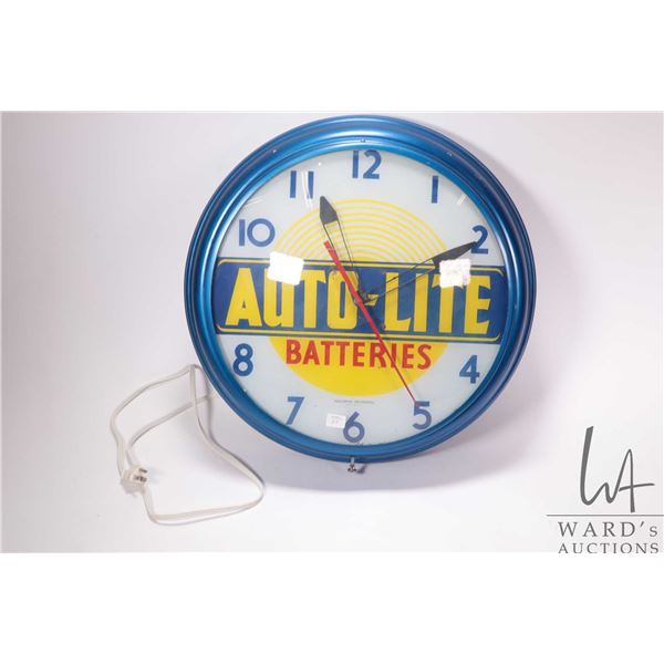 Vintage Auto-Lite Batteries electric wall clock, 19" in diameter, working at time of cataloguing