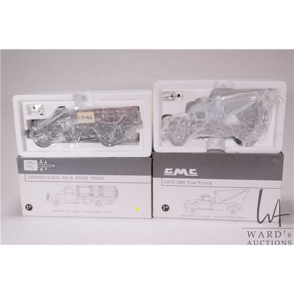 1st Gear 1:34 scale die cast vehicles including 1958 GMC Tow Truck and a International KB-8 Stake Tr