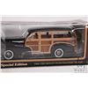 Image 2 : 2 1:18 scale collectible die cast cars including Maisto 1948 Chevrolet Fleetmaster Woody and a Road 