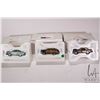 Image 1 : 3 1:43 scale Franklin Mint die cast collectible cars including 1950 Ford Woody, 1950 Chrysler Town a