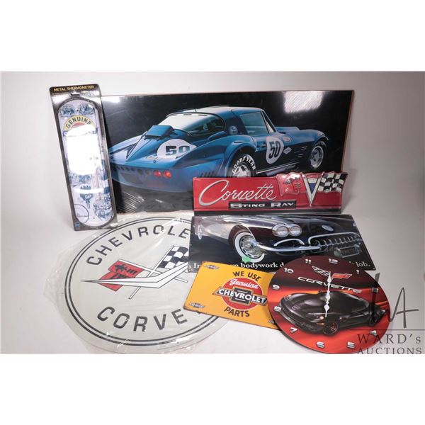 5 Chevy and Corvette related metal wall signs, Corvette clock, and a mid 60's Corvette poster signed