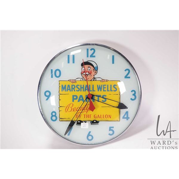 Vintage Canadian Neon-Ray clock company "Marshall Wells Paints" wall clock with glass face and light