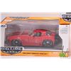 Image 2 : 3 1:24 scale Jada die cast miniature model cars including 1963 Corvette, 1957 Chevrolet Belair, and 