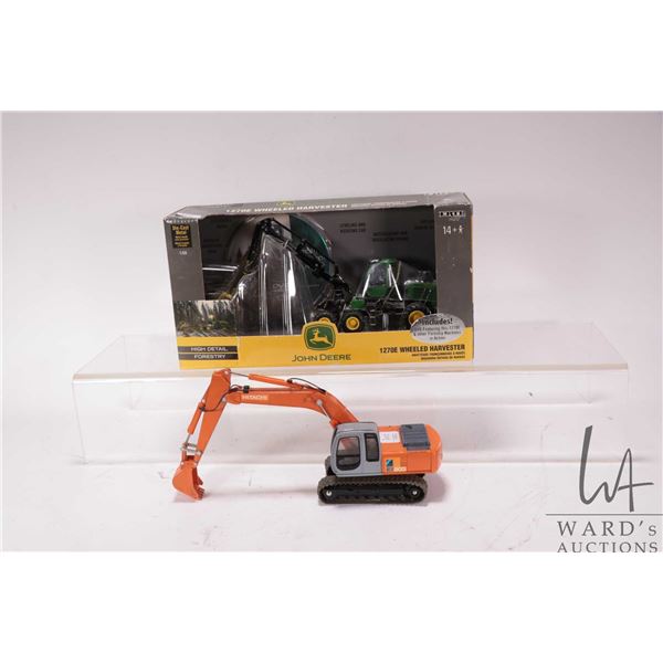 Two die cast toys including 1:50 scale John Deere 1270E Wheeled Harvester and a 1:40 scale Hitachi E