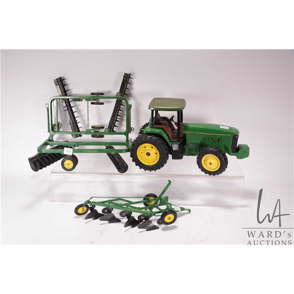 Ertl John Deere 8300 tractor with folding disc and four bottom plow