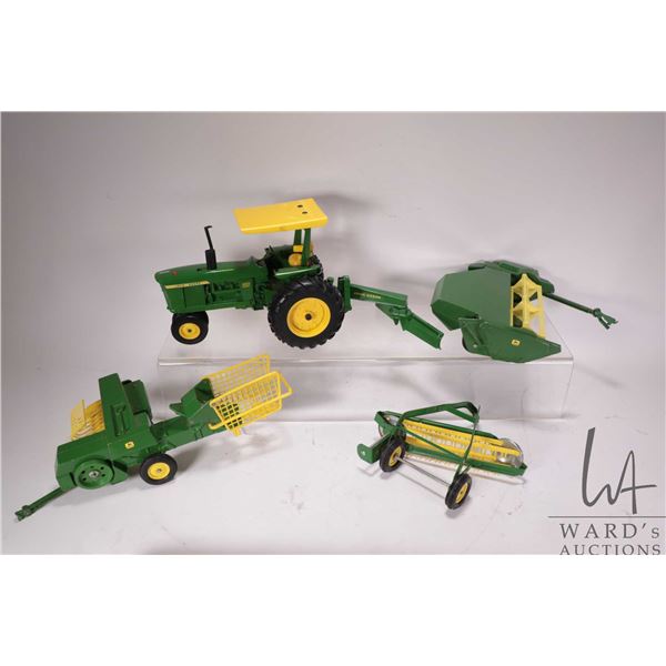 Selection of Ertl 1:18 scale die cast John Deere toys including 4020 tractor with blade, pull type s