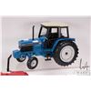 Image 2 : Two Ertl 1:18 scale die cast tractors including a Case 2594 and a Ford 7740