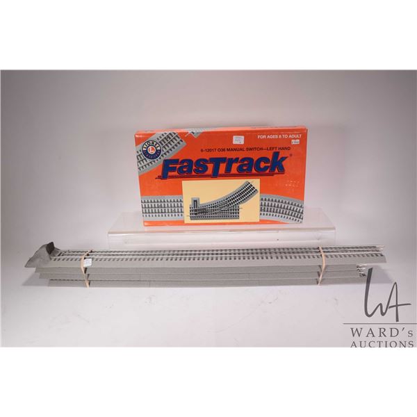 Lionel O gauge Fastrack 6-12017 O36 Manual Switch- Left Hand and four 30" triple tracks