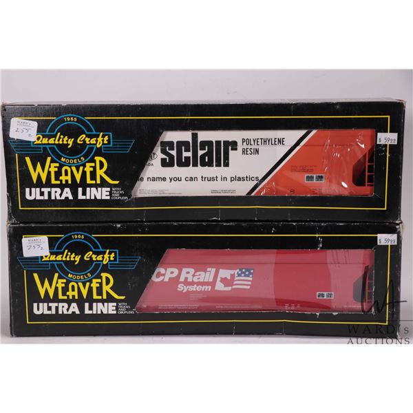 Two Weaver Ultra Line grain cars including CP Rail and Sclair