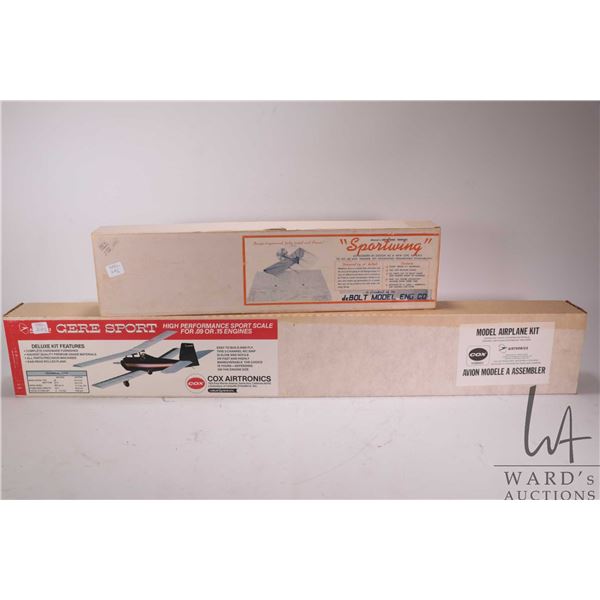 Two wooden airplane model kits including a Airtronics Cox Gere Sport and a deBotl Model Eng. Co. "Sp