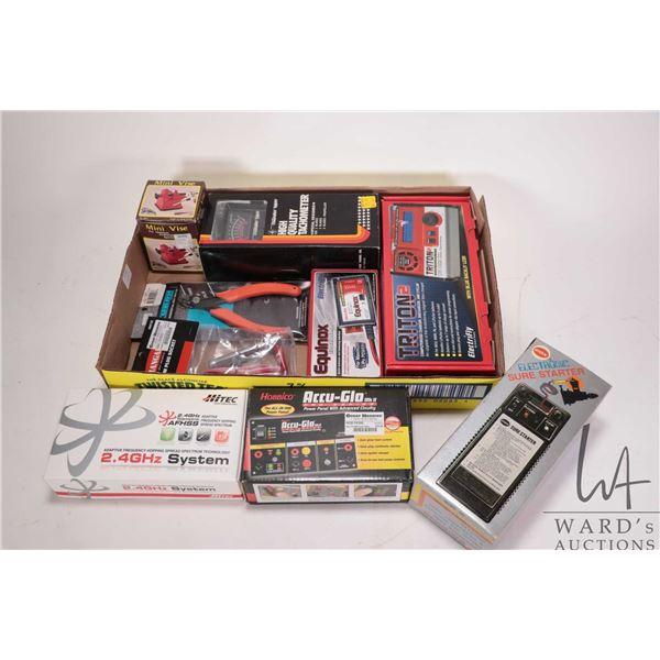Selection of tools and accessories including Accu-Glo power panel, Cox electronic sure start, High q