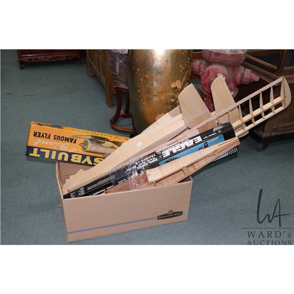 Box of assorted wooden plane parts
