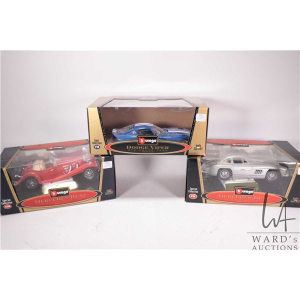 Three Burago die cast model cars including 1996 Dodge Viper GTS Coupe, 1954 Mercedes-Benz 300 SL and