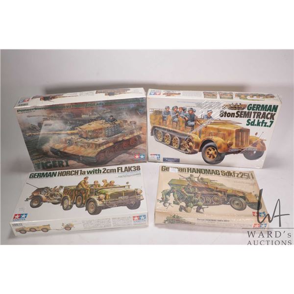 Four 1:35 scale Tamiya WWII vehicle model kits, all new in box
