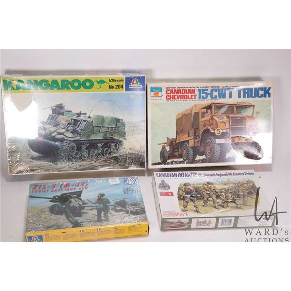 Four 1:35 scale WWII vehicle model kits including two Italari, one Dragon and one Peerless Max