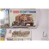 Image 3 : Four 1:35 scale WWII vehicle model kits including two Italari, one Dragon and one Peerless Max