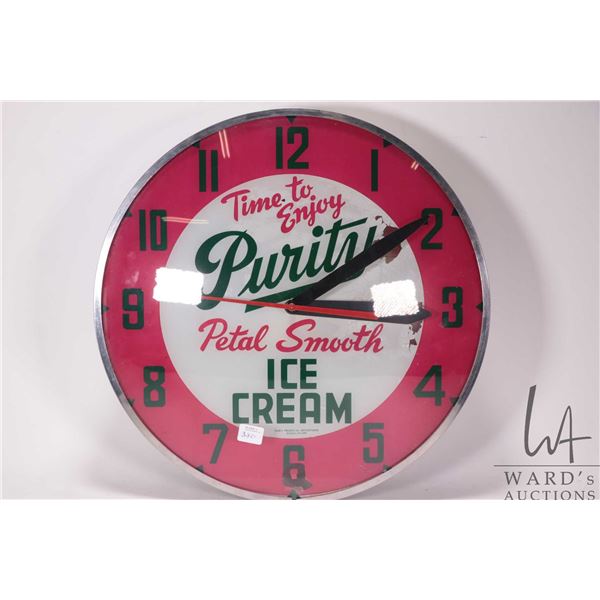 Vintage 16-1/2" round "Purity Ice Cream" wall clock, not working at time of cataloguing