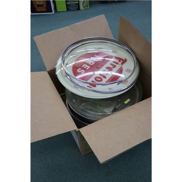 Box containing an assortment of parts and accessories for vintage wall clocks
