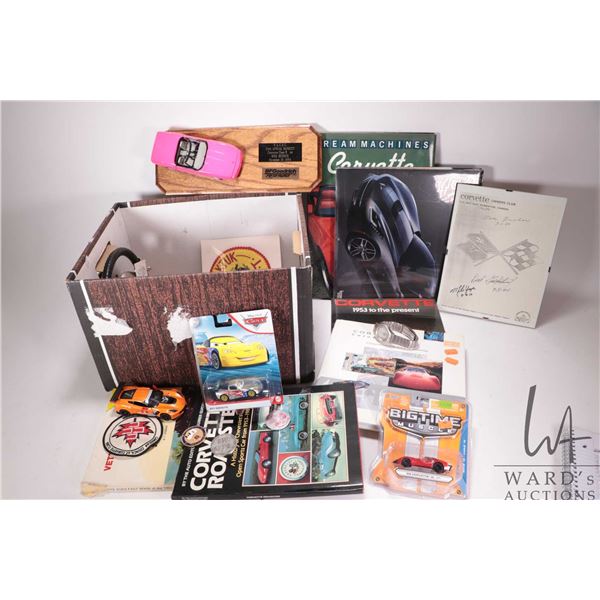 Selection of Corvette collectable items including die cast cars, badges, calendars, pins, books, etc