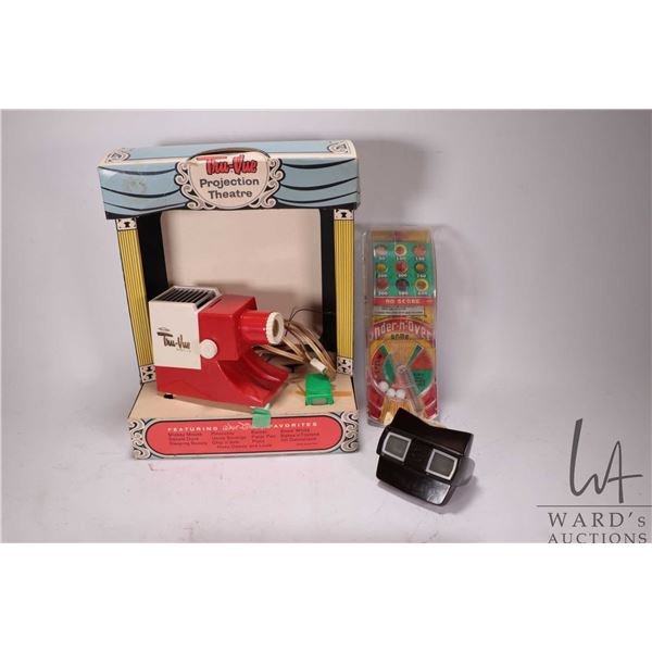 Selection of vintage toys including Sawyer's Tru-Vue projection theatre, bakelite Viewmaster, and a 
