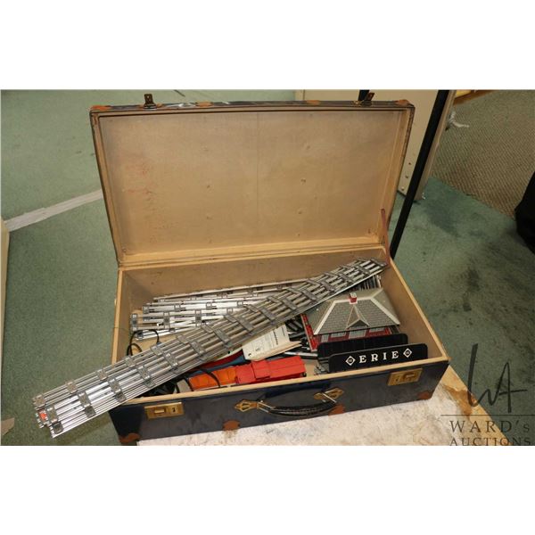 Vintage Lionel O gauge train set, comes with engine and tender, caboose, flat car with boat, flat ca