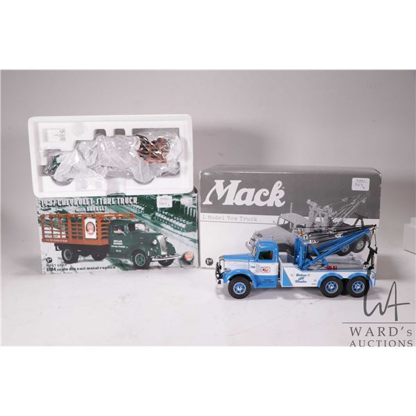 Two First Gear die cast model 1:34th scael die cast cars including 1937 Chevrolet Stake truck with b
