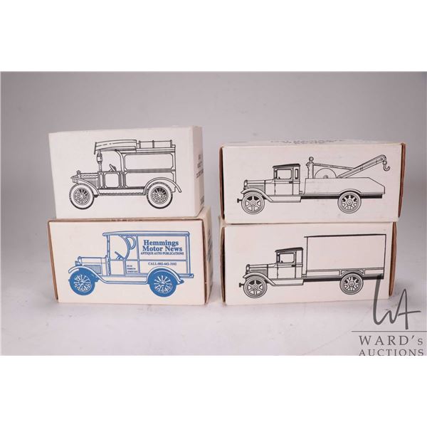 Four Ertl collectible banks including 1913 Model T delivery bank, 1931 Hawkeye Wrecker bank, 1931 Ha